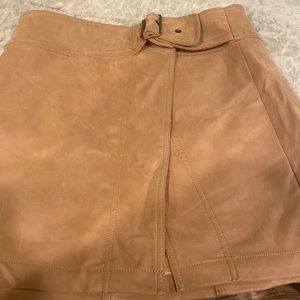 Free people, worn once, camel colored ,size 2 mini skirt.
